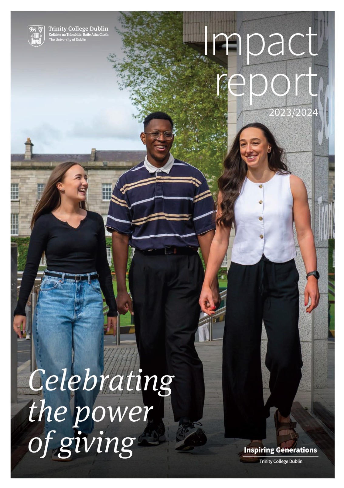 Three students of the Galen Weston Foundation Scholarships sitting, socialising and laughing outside on a sunny day at Trinity College Dublin